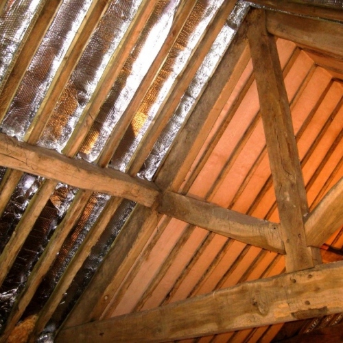 Space blanket insulation in moot hall ceiling